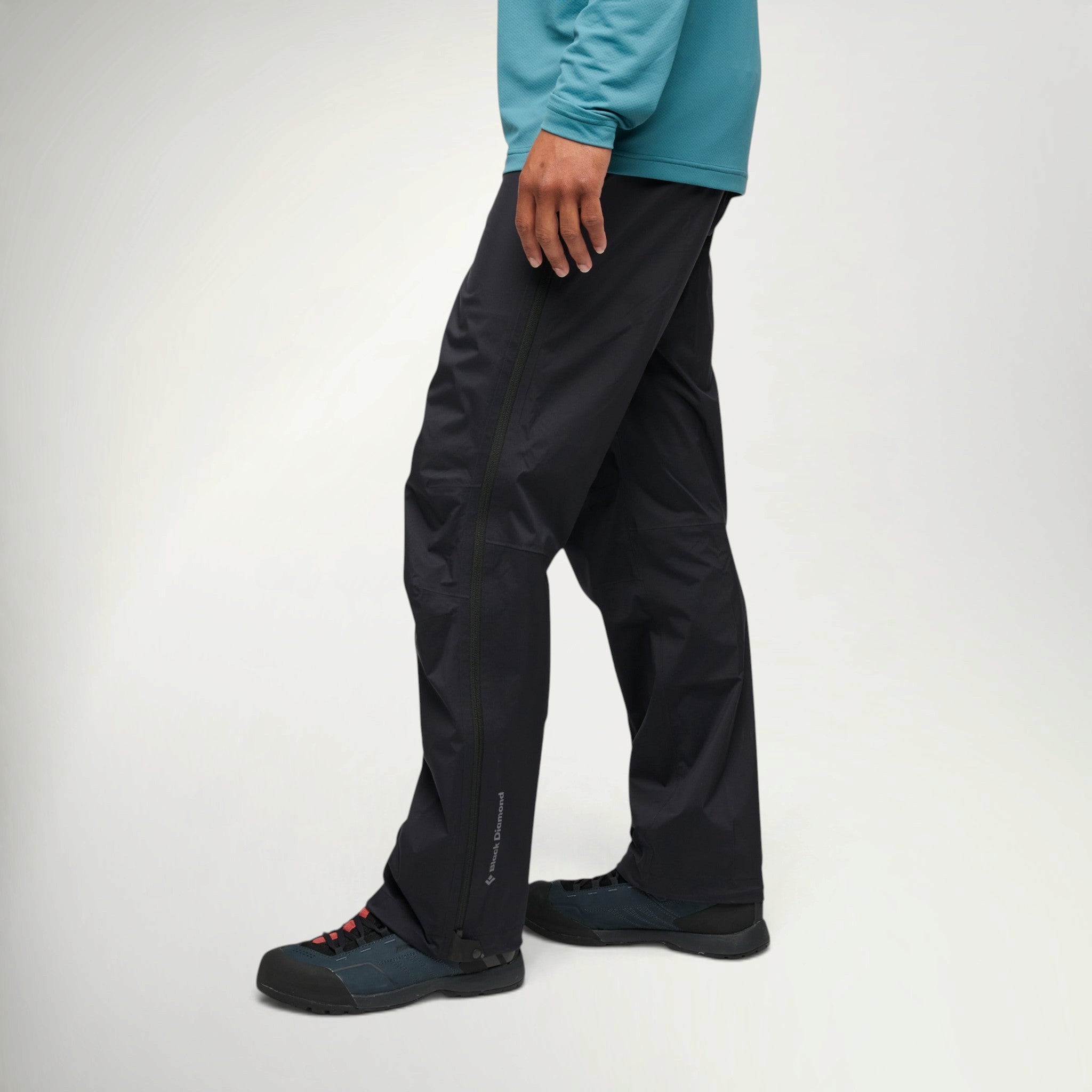 Black Diamond Fineline Stretch Pant Men's in Black worn by a hiker, side view