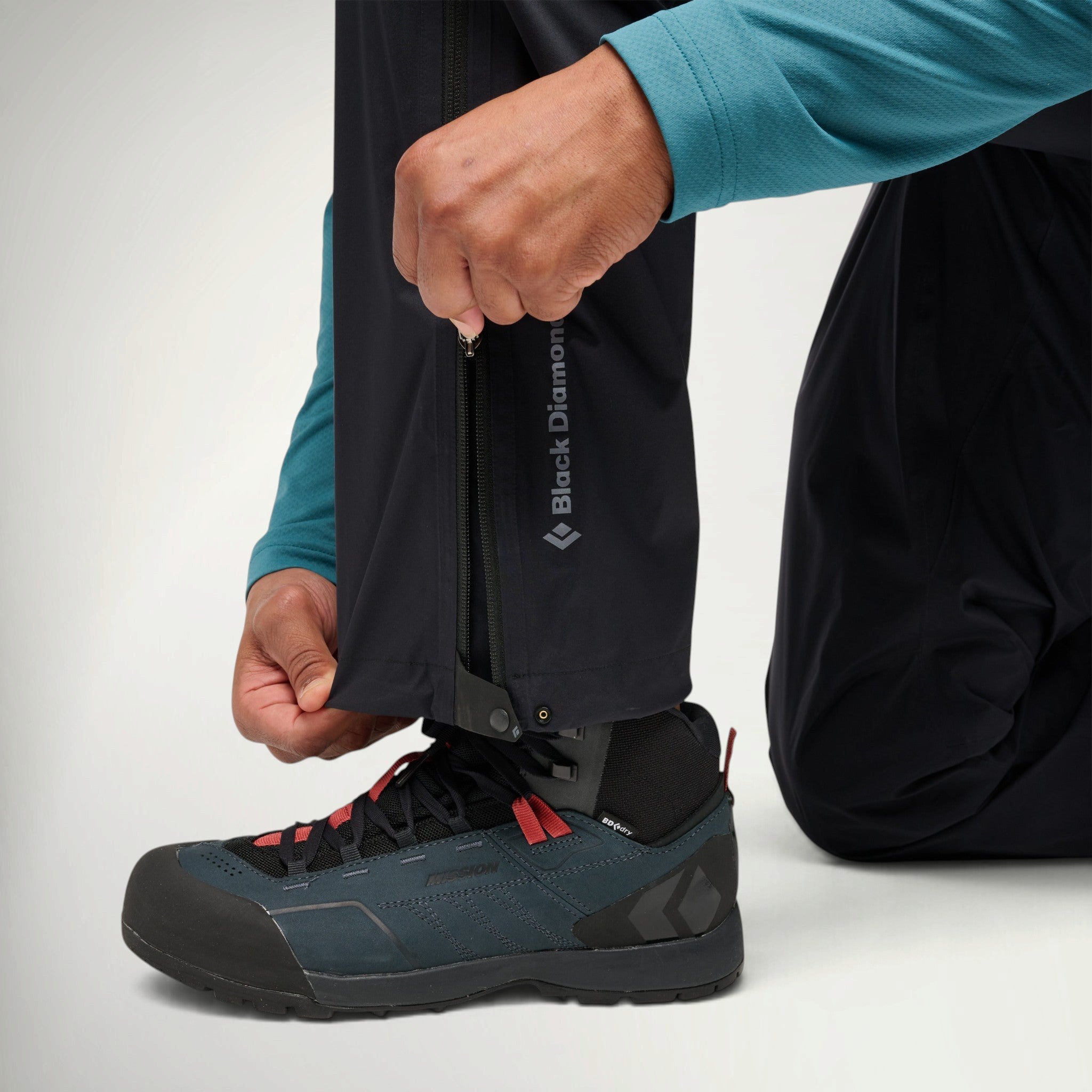 Black Diamond Fineline Stretch Pant Men's, close-up of the ankle zip over a trail shoe