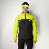 Dynafit Alpine 3-Layer Jacket Men's in Ultra Yellow worn by a runner, front view