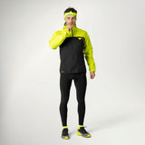 Dynafit Alpine 3-Layer Jacket Men's in Ultra Yellow worn by a runner, side view