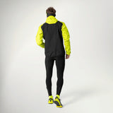 Dynafit Alpine 3-Layer Jacket Men's in Ultra Yellow worn by a runner, back view