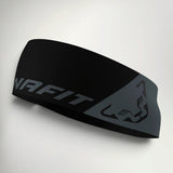Dynafit Performance running headband in Cinder, black with large grey Dynafit lettering and snow leopard logo