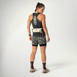 Dynafit Trail Belt in Overcast worn by a runner, full-length back view