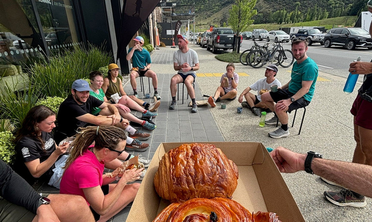 The Kinisi Running crew after a group run, drinking coffee and enjoying pastries.