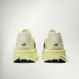 New Balance SuperComp Rebel Men's in Pistachio Butter, heel view of the pair