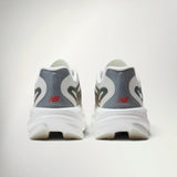 New Balance SuperComp Rebel Women's in Sea Salt, heel view of the pair