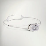 Petzl Swift LT headlamp in White, with slim white lamp body and thin cord headband