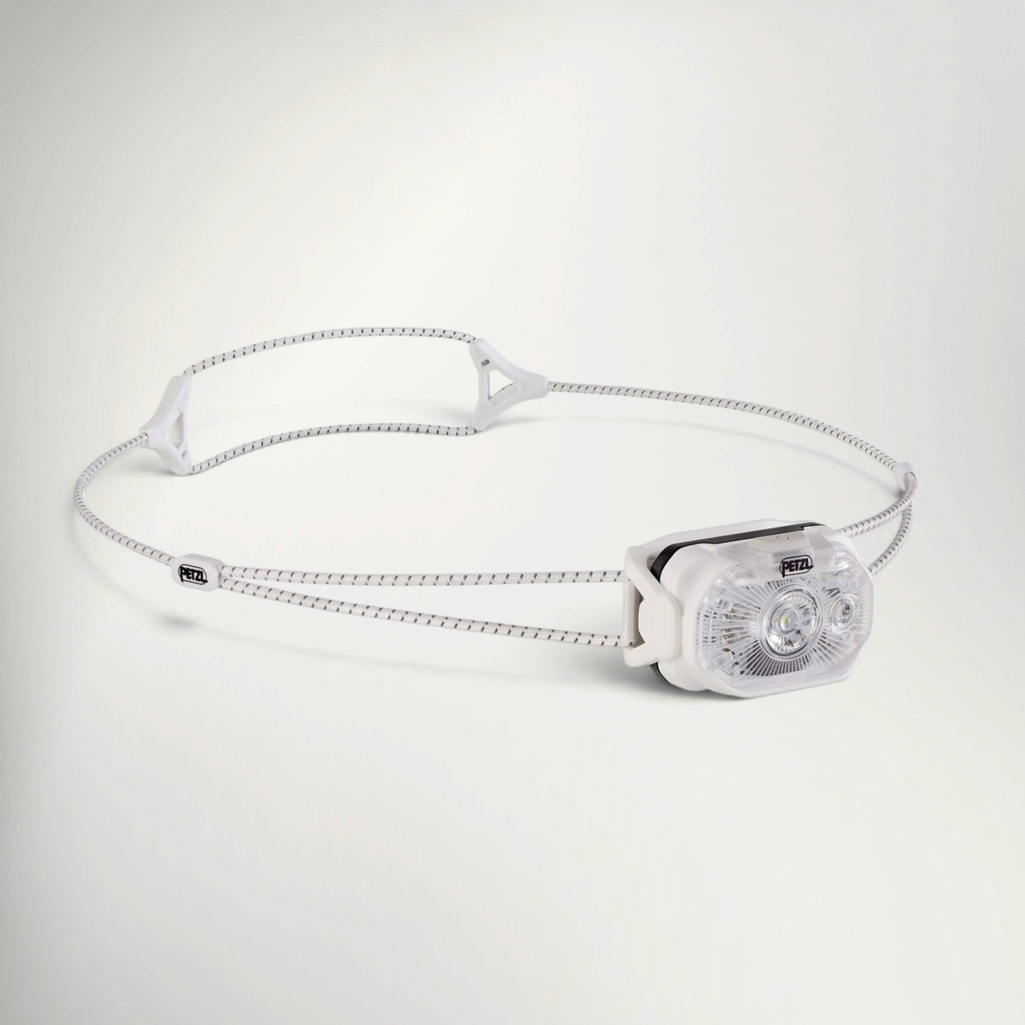 Petzl Swift LT headlamp in White, with slim white lamp body and thin cord headband