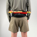 Runner wearing the Raide LF 2L Running Belt loaded with soft flasks
