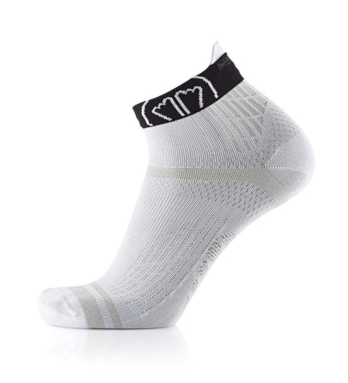White ankle sock with black band featuring heart designs on a white background