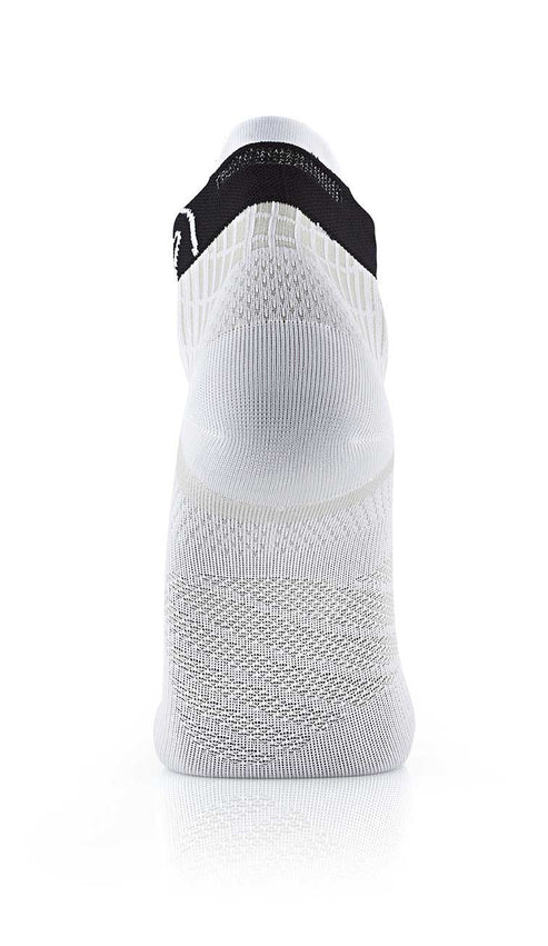 White ankle sock with black top on a white background