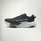 The North Face Altamesa 500 V2 Women's trail running shoe in Black/White, side view with black upper, white lettering and white midsole