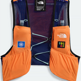 The North Face running vest with orange side pockets and a navy mesh back, shown flat on a white background.