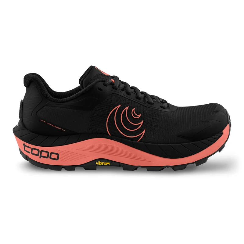 Black and pink running shoe with 'topo' branding on a white background