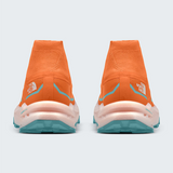 A pair of The North Face sneakers shown from the back, featuring a vibrant orange knit upper, a thick pale pink and white midsole, and teal outsoles.